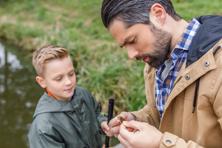 father and son fishing togetherの写真素材