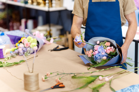 Florist working in flower shopの写真素材