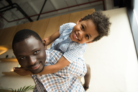 african american father and child huggingの写真素材