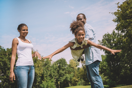african american family at countrysideの写真素材