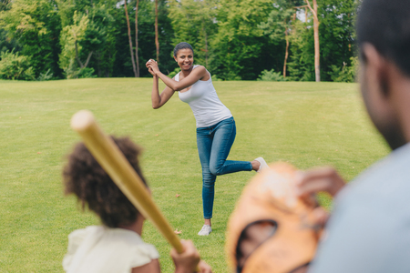 african american family playing baseballの写真素材
