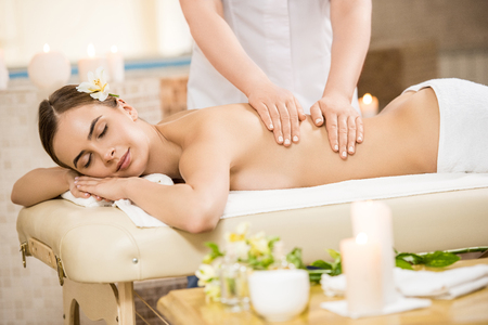 woman relaxing and having massageの写真素材