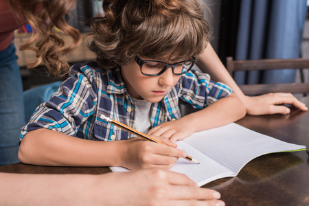 child doing homeworkの写真素材