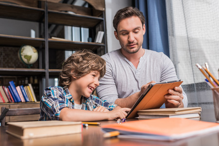 family using tabletの写真素材