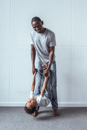 father and son having fun togetherの写真素材