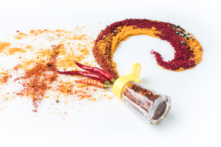 beautiful spices composition with pepper pot isolated on whiteの写真素材