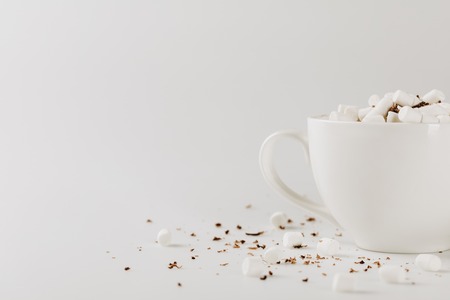 hot chocolate with marshmallows in cup, isolated on white with copy spaceの写真素材