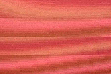 close up view of red velvet fabric texture