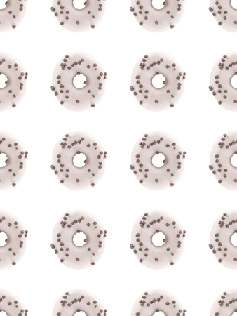 close-up view of pattern from delicious frosted doughnuts isolated on whiteの写真素材