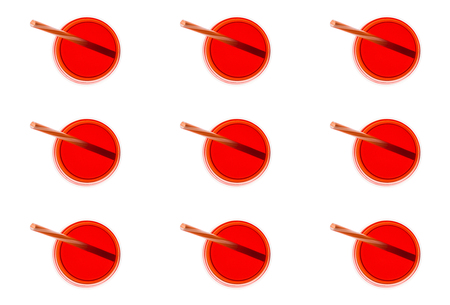 top view of arranged glasses of juice with straws isolated on whiteの写真素材