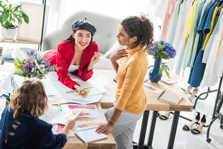 fashion designers working with sketchesの写真素材