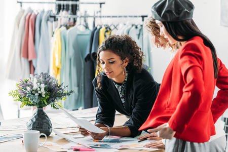 fashion designers working with sketchesの写真素材
