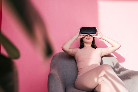 beautiful girl in vr headsetの写真素材