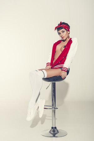 sexy girl in bomber jacketの写真素材