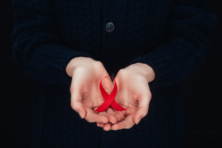 aids ribbon in handsの写真素材