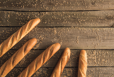baguettes and grains on tableの写真素材