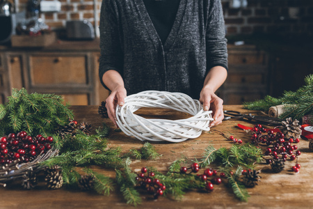 florist with Christmas wreathの写真素材
