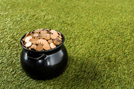 golden coins in pot standingの写真素材