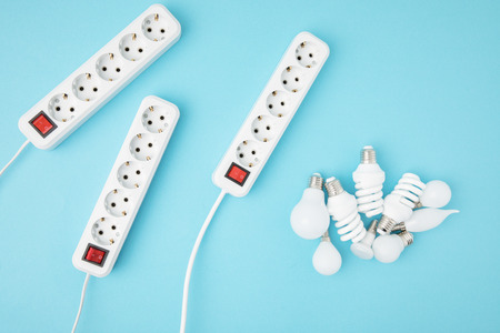 flat lay with extension cords and different light bubs
