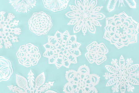 christmas background with decorative paper snowflakes