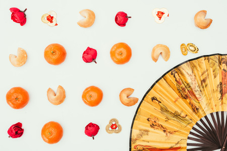 top view of chinese new year composition with handheld fanの写真素材