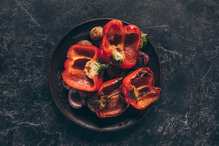 delicious meat with vegetables preparing on grillの写真素材