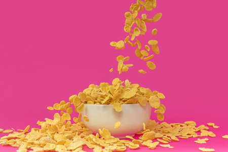 close-up view of sweet delicious corn flakes fallingの写真素材