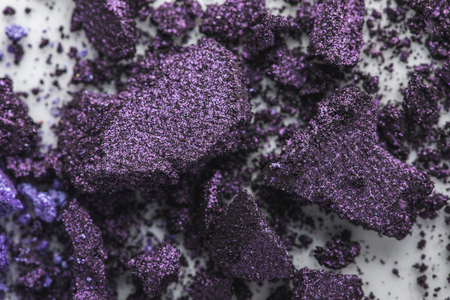 cosmetic purple eye shadows as backgroundの写真素材