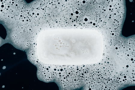 top view of white soap with foam