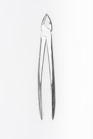 dental tool isolated on whiteの写真素材