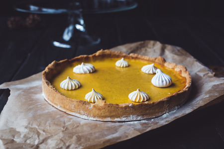 pumpkin pie on parchment paperの写真素材