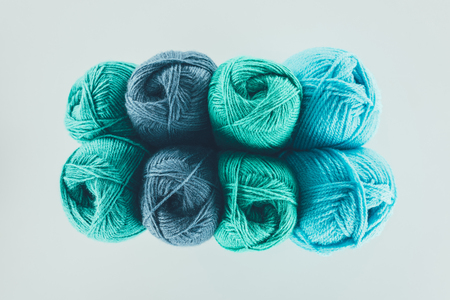 blue and green knitting yarn ballの写真素材