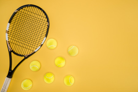 Tennis balls in a row isolatedの写真素材