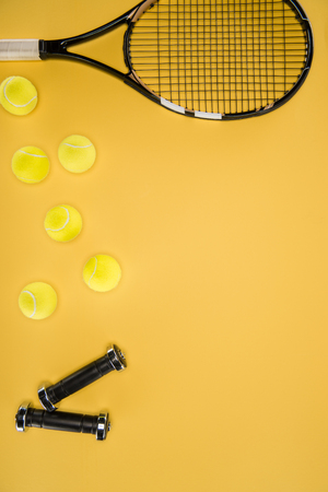 Tennis balls in a row isolatedの写真素材