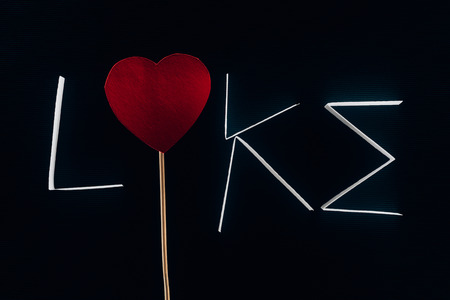word LIKE made of paper sheets and heart on stickの写真素材