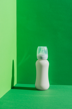 plastic baby bottle with milkの写真素材