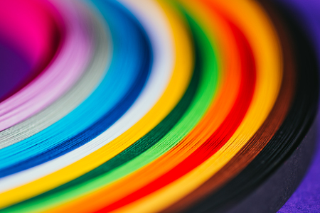 colored bright quilling paper stripes on purpleの写真素材