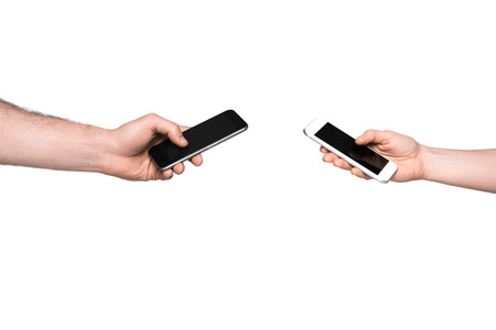 man and woman using smartphonesの写真素材