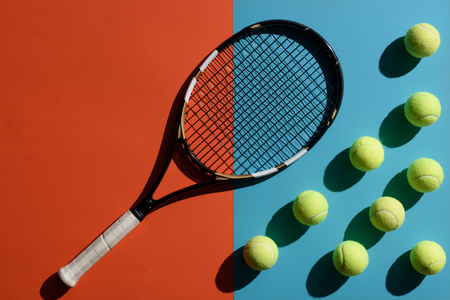 tennis racket and ballsの写真素材