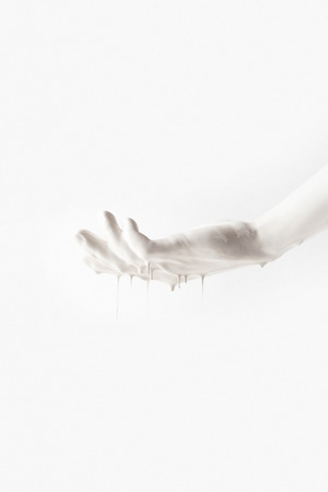 girl in white paint isolated on whiteの写真素材