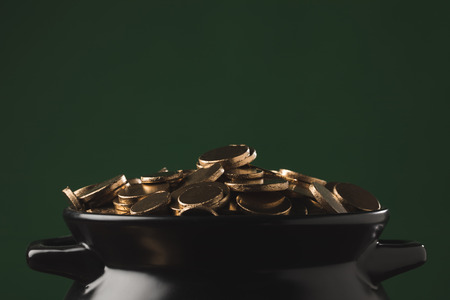 shining golden coins in pot, st patricks day conceptの写真素材