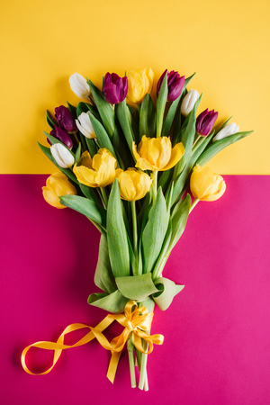 top view of spring tulips with ribbon for international womens dayの写真素材