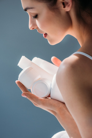 woman holding plastic containersの写真素材