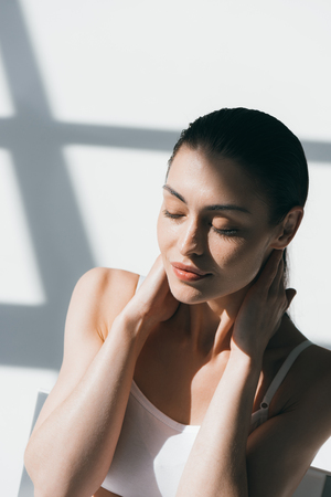 woman with wet slicked hairの写真素材