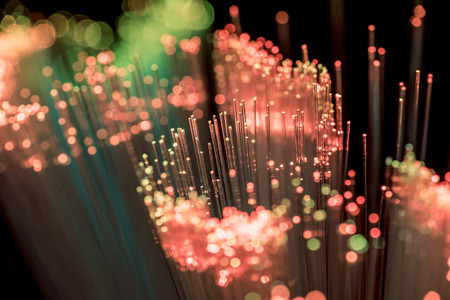 Close up of shiny pink fiber optics texture backgroundの写真素材