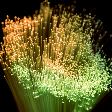 glowing green and yellow fiber optics texture の写真素材