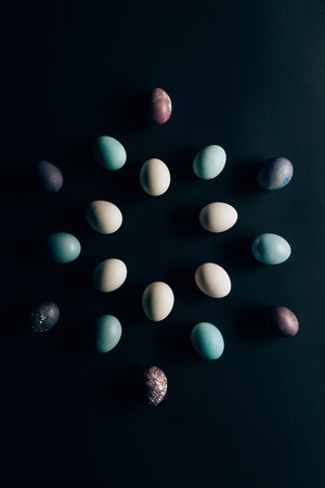 flat lay of colored painted easter eggsの写真素材