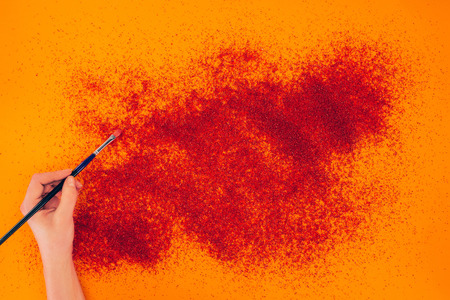 cropped image of woman making sand animationの写真素材