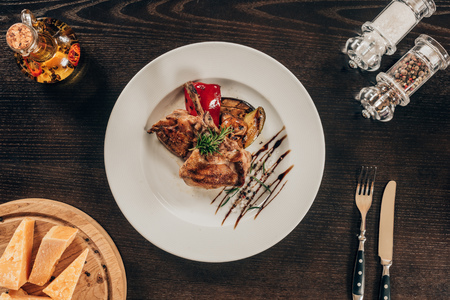 grilled chicken with vegetables on plateの写真素材