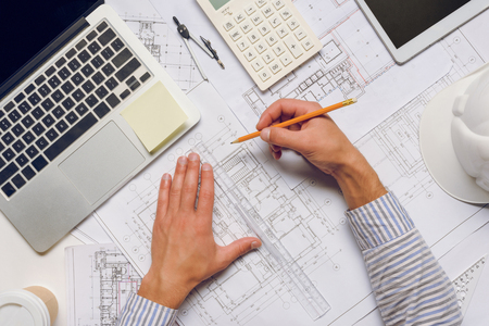 architect working with blueprintsの写真素材